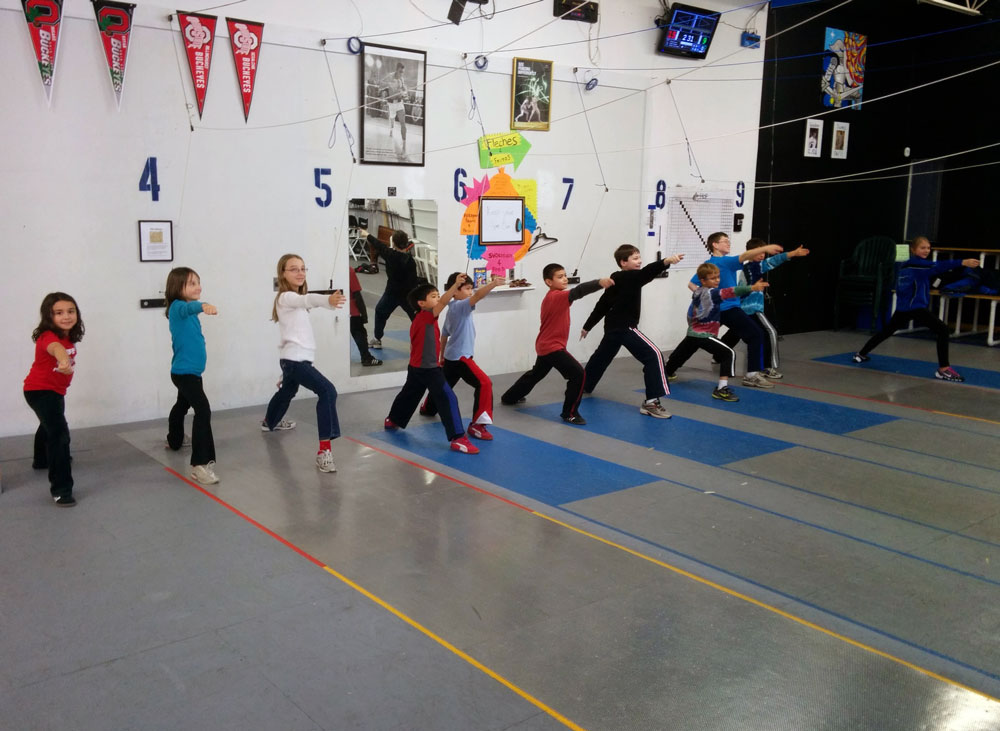 Youth fencing class at Hooked on Fencing